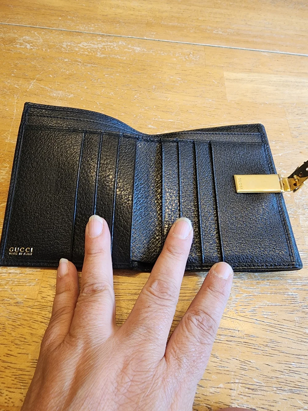 vintage Gucci black textured leather compact bifold wallet